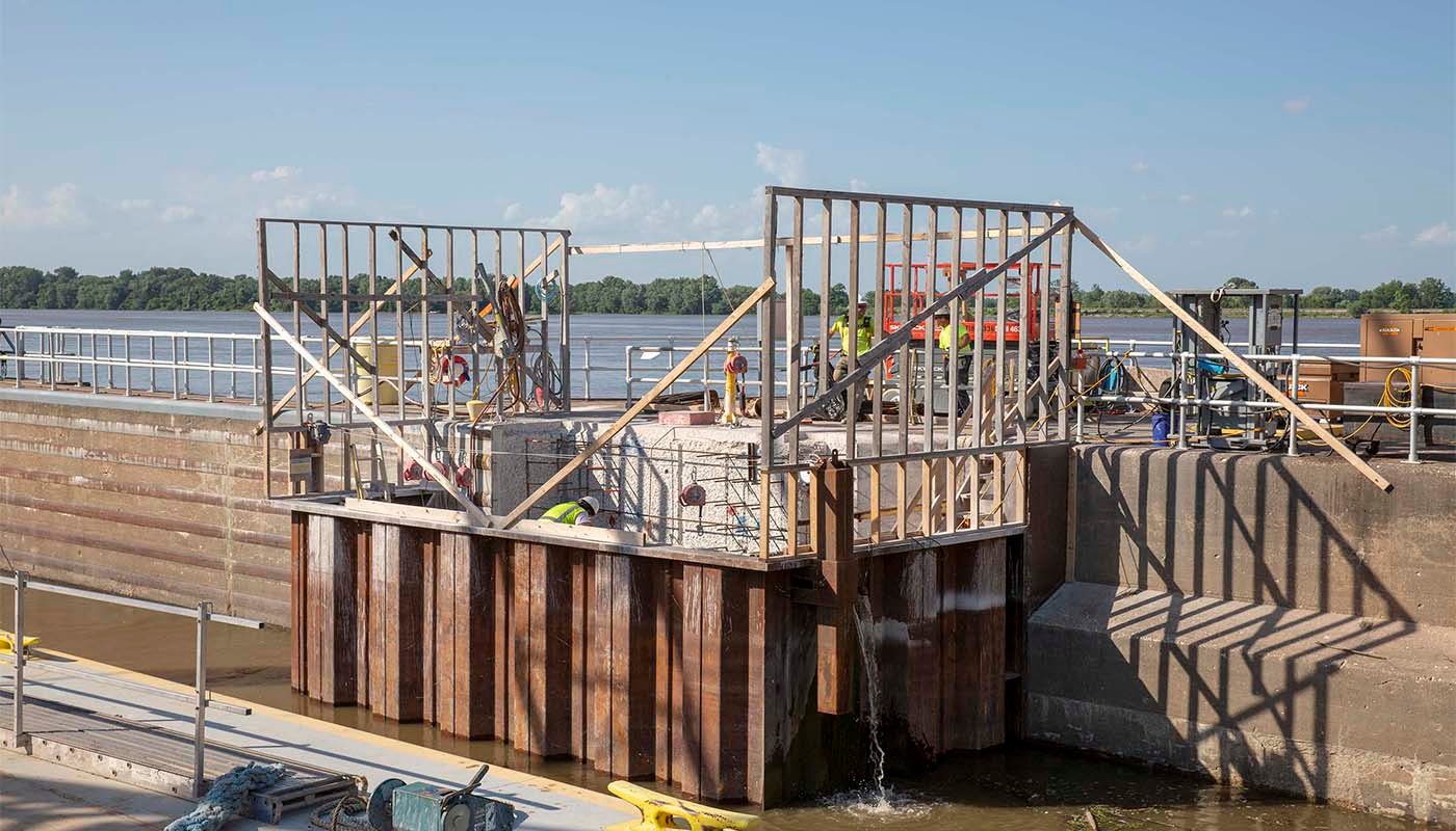 J.F. Nelosca builds a cofferdam that retains water and allows a work area to be dewatered