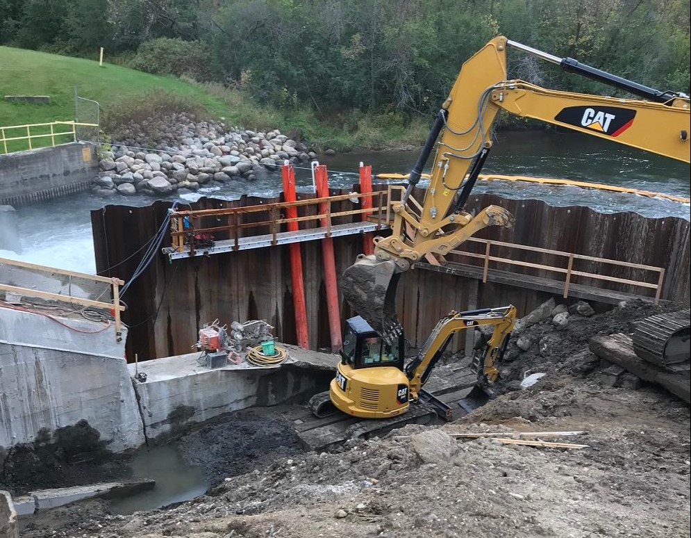 Excavation downstream of permanent sheeting wall