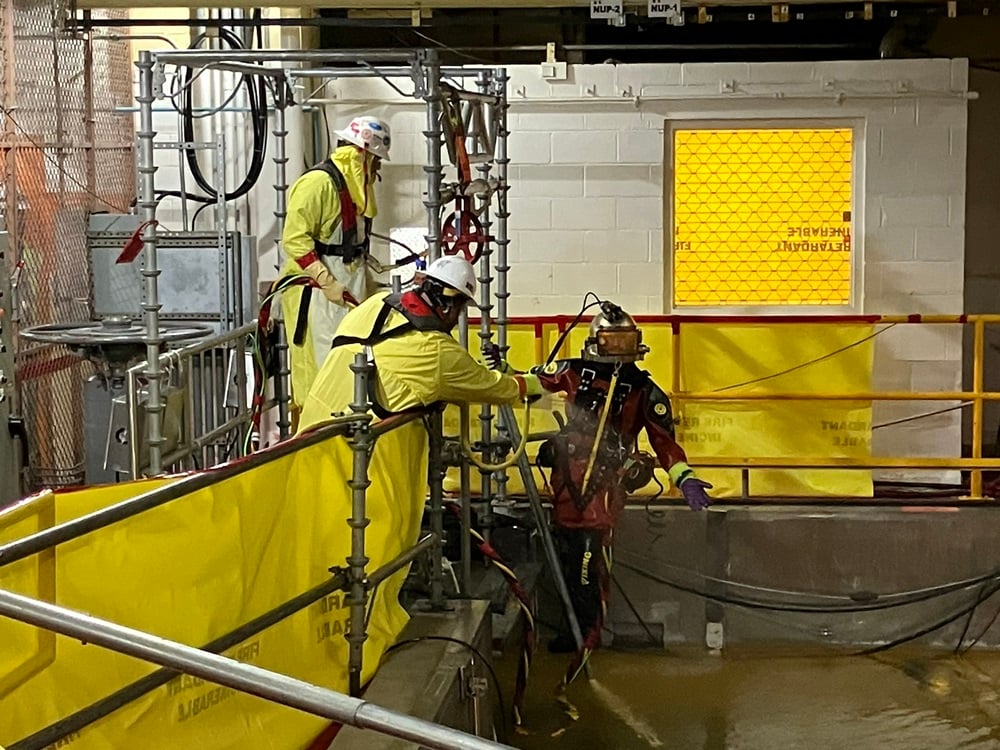 Nuclear diving 101 inspections cleaning_water spray before entering the water