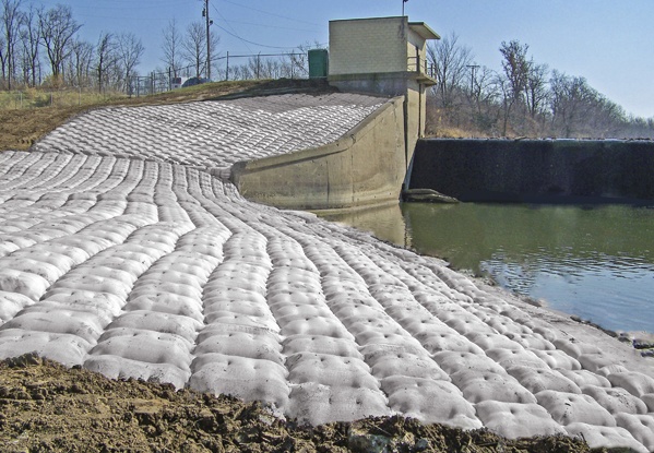 dam construction, scour and erosion, scour remediation, erosion protection, embankment protection, fabric formed articulating block mat, articulating block mat