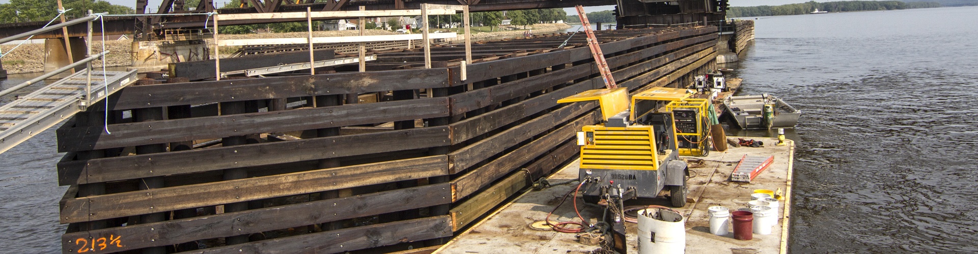 timber cribbing, bridge protection systems, railroad bridge protection, navigation protection