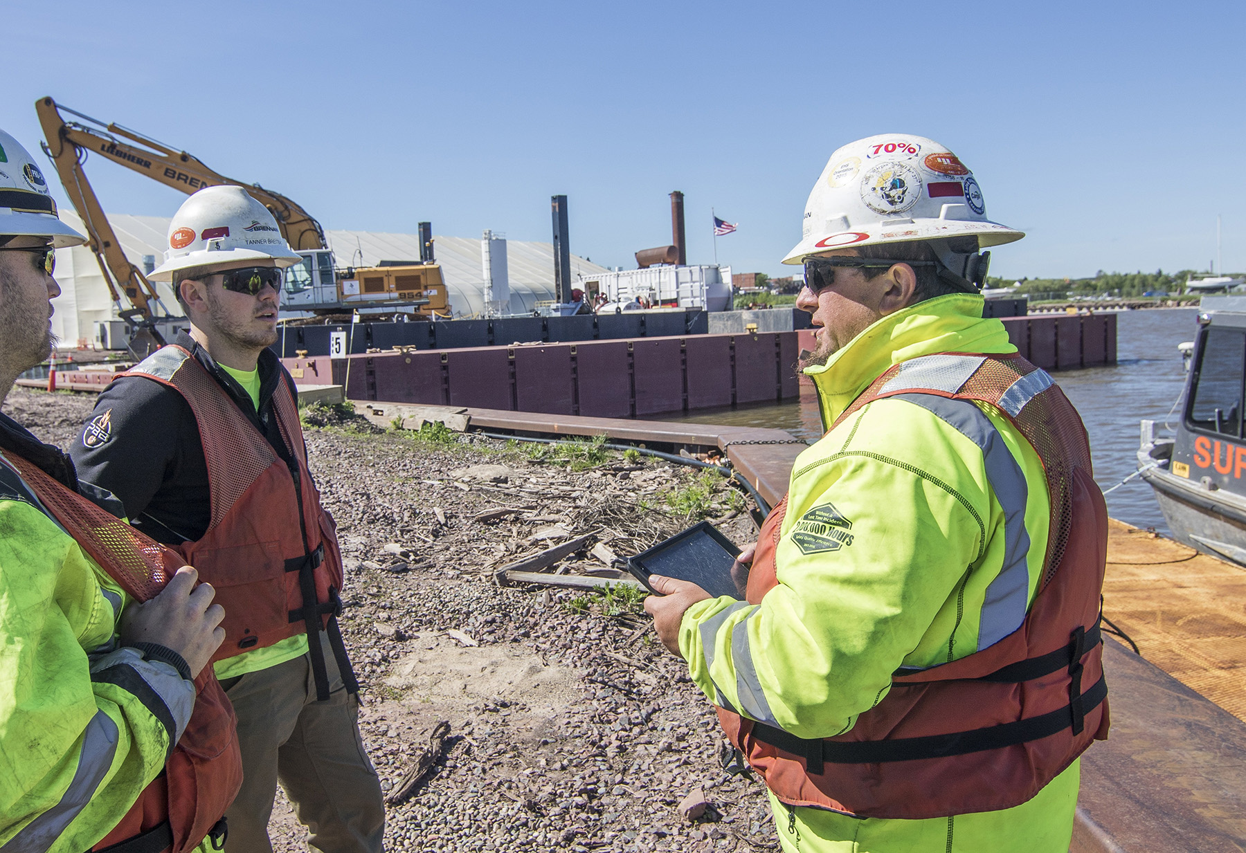 Safety meeting on site with tablet